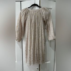 Soft baby pink tulle dress with sparkly stars bought from Paris.